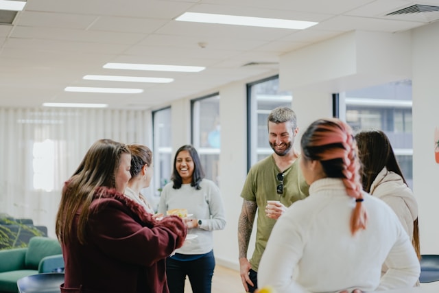 Corporate professionals collaborating in a supportive environment