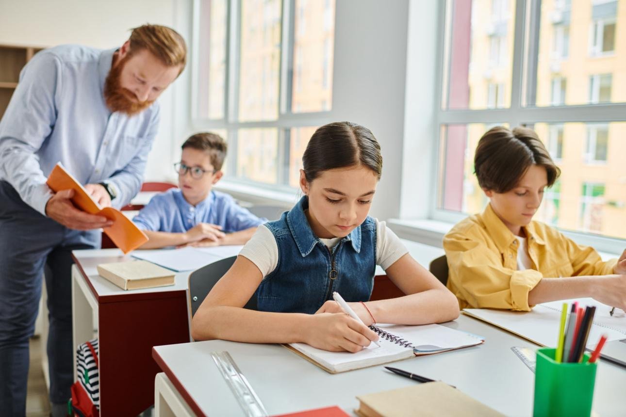 Therapist working one-on-one with a child on learning exercises