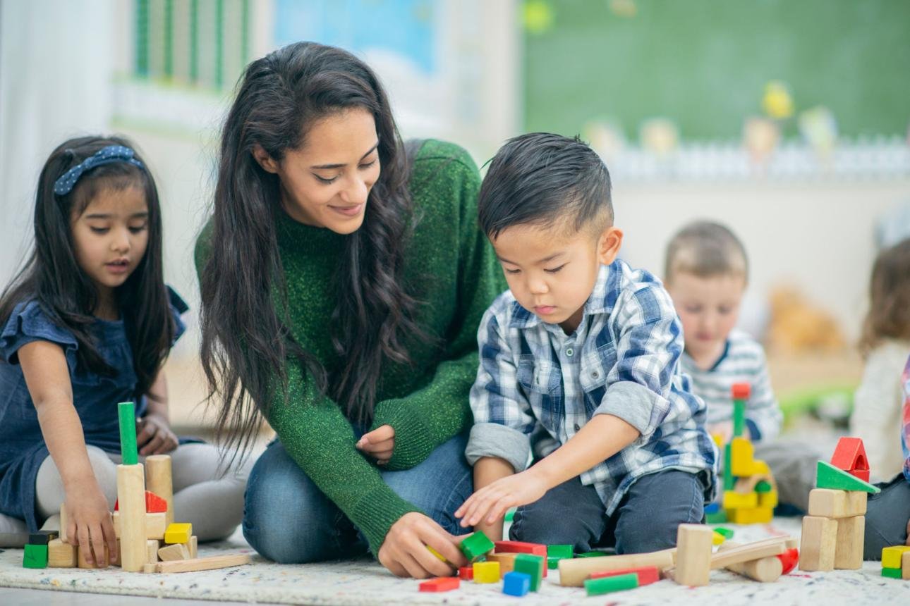 Child engaging in play-based learning activity for school readiness in Dubai