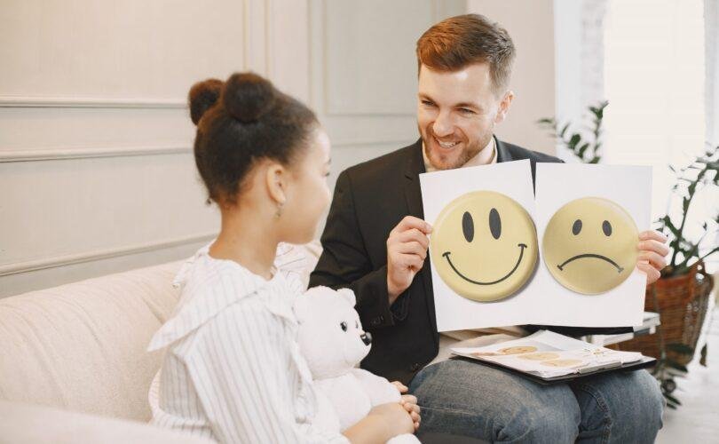 Therapist helping child with emotional regulation and calmness
