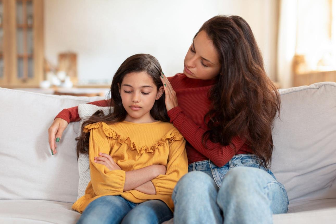 Parent discussing concerns with child psychologist